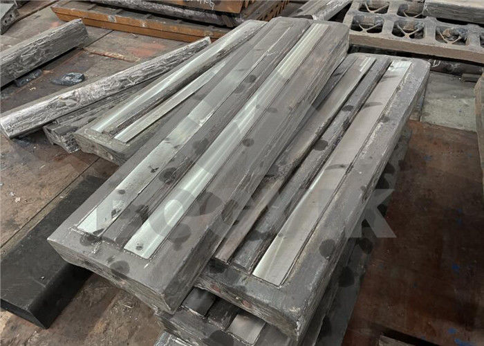 Martensitic Steel with Ceramic Insert Blow Bar for Recycling of Building Rubble with Iorn Content